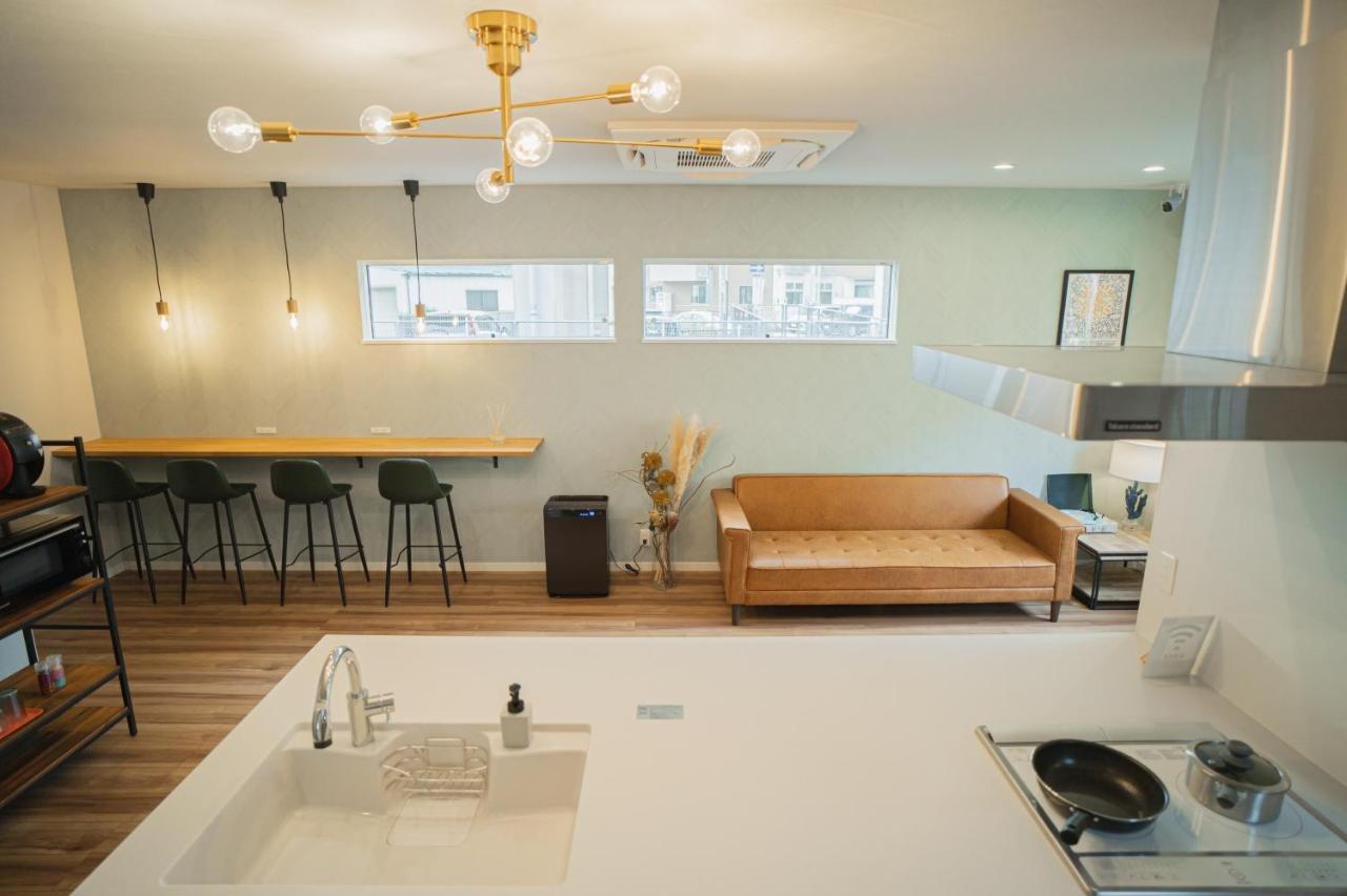 Orange County Guest House Izumisano Bagian luar foto